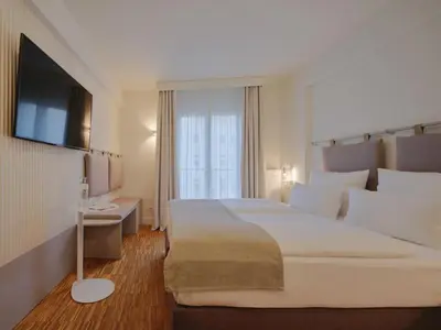 Ein Bett oder Betten in einem Zimmer der Unterkunft Classik Hotel Hackescher Markt - Self Check In