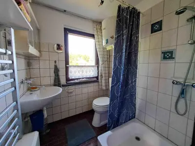 Ein Badezimmer in der Unterkunft Ferienhaus Gransee unmittelbar am Stechlinsee - Radweg