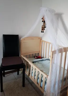 Ein Bett oder Betten in einem Zimmer der Unterkunft Ferienhaus Gransee unmittelbar am Stechlinsee - Radweg