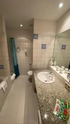 Ein Badezimmer in der Unterkunft Refugium am Engelbecken