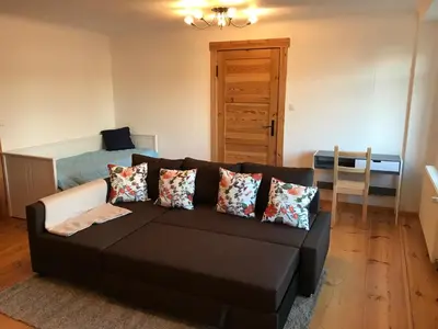 Ein Bett oder Betten in einem Zimmer der Unterkunft Sanierte möblierte Altbauwohnung am Waldrand für bis zu 6 Personen