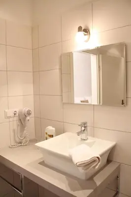 Ein Badezimmer in der Unterkunft Hotel Garni Kleist am Kurfürstendamm