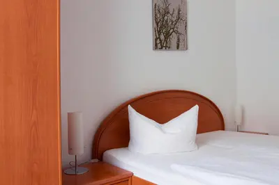 Ein Bett oder Betten in einem Zimmer der Unterkunft Hotel Eckstein