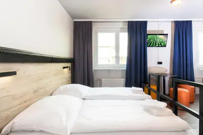 Ein Bett oder Betten in einem Zimmer der Unterkunft a&o Berlin Mitte