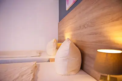 Ein Bett oder Betten in einem Zimmer der Unterkunft BlnCty Hotel