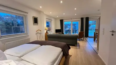 Ein Bett oder Betten in einem Zimmer der Unterkunft Kleemann´s Apartment****