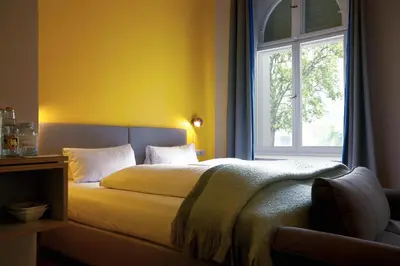 Ein Bett oder Betten in einem Zimmer der Unterkunft Wil7 Boutique Hotel
