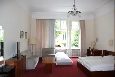 Ein Bett oder Betten in einem Zimmer der Unterkunft Kurfürst am Kurfürstendamm