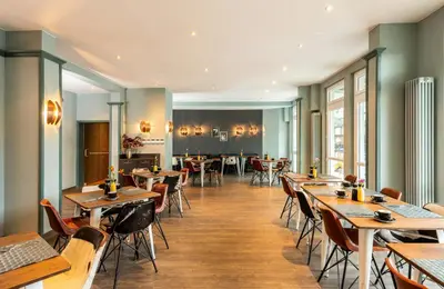 Ein Restaurant oder anderes Speiselokal in der Unterkunft Leonardo Boutique Hotel Berlin City South