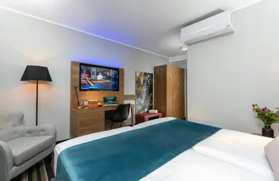 Ein Bett oder Betten in einem Zimmer der Unterkunft Leonardo Boutique Hotel Berlin City South