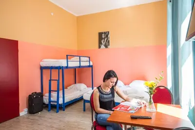 Ein Bett oder Betten in einem Zimmer der Unterkunft Pegasus Hostel Berlin