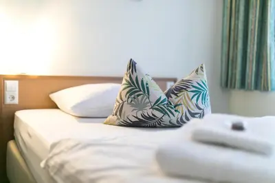 Ein Bett oder Betten in einem Zimmer der Unterkunft martas Hotel Allegra Berlin