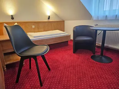 Ein Bett oder Betten in einem Zimmer der Unterkunft Flora-Apart-Residenz