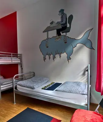 Ein Bett oder Betten in einem Zimmer der Unterkunft Heart of Gold Hostel & Capsules Berlin