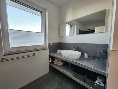 Ein Badezimmer in der Unterkunft Falkenapartment Berlin