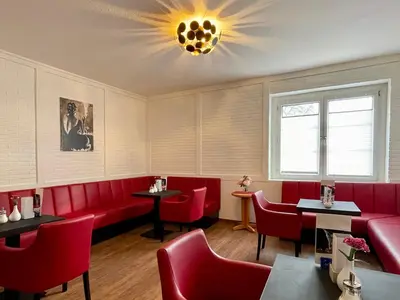 Ein Sitzbereich in der Unterkunft Morada Hotel Am Mellensee