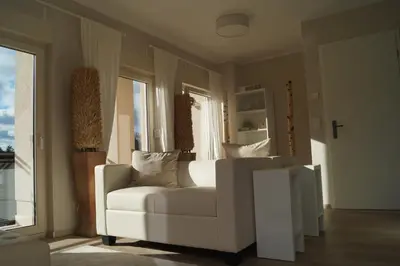 Ein Sitzbereich in der Unterkunft Haus am See