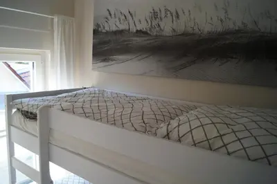 Ein Bett oder Betten in einem Zimmer der Unterkunft Haus am See