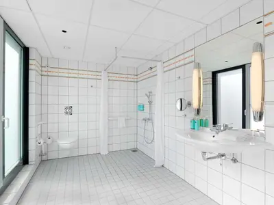 Ein Badezimmer in der Unterkunft Novotel Berlin Mitte