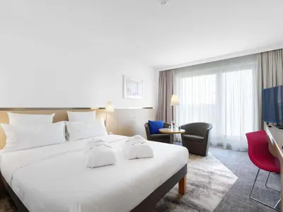 Ein Bett oder Betten in einem Zimmer der Unterkunft Novotel Berlin Mitte