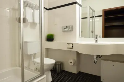 Ein Badezimmer in der Unterkunft relexa hotel Stuttgarter Hof