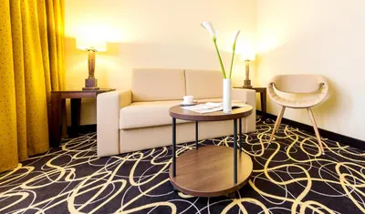 Ein Sitzbereich in der Unterkunft relexa hotel Stuttgarter Hof