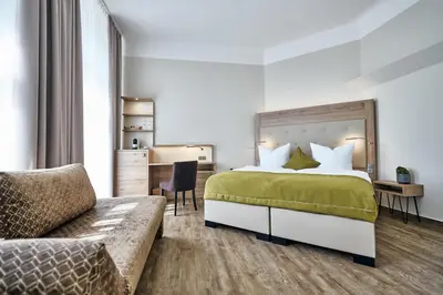 Ein Bett oder Betten in einem Zimmer der Unterkunft Lounge-Hotel Seeterrassen