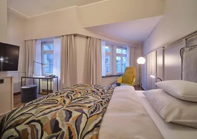 Ein Bett oder Betten in einem Zimmer der Unterkunft Classik Hotel Alexander Plaza