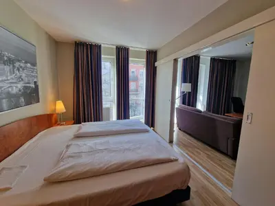 Ein Bett oder Betten in einem Zimmer der Unterkunft TopDomizil - Apartments 