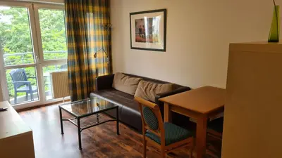 Ein Sitzbereich in der Unterkunft TopDomizil - Apartments 