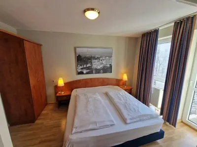 Ein Bett oder Betten in einem Zimmer der Unterkunft TopDomizil - Apartments 