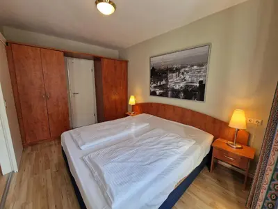 Ein Bett oder Betten in einem Zimmer der Unterkunft TopDomizil - Apartments 