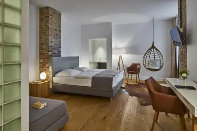 Ein Bett oder Betten in einem Zimmer der Unterkunft Hotel 38