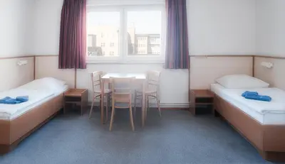 Ein Bett oder Betten in einem Zimmer der Unterkunft Steps-Hotel