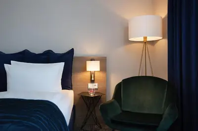 Ein Bett oder Betten in einem Zimmer der Unterkunft Holiday Inn Berlin City Center East Prenzlauer Berg by IHG