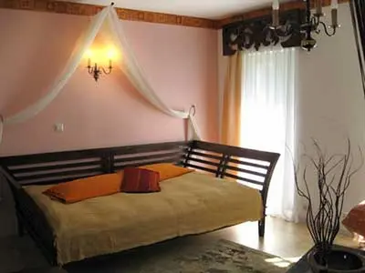 Ein Bett oder Betten in einem Zimmer der Unterkunft Bali Suite