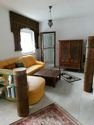 Ein Sitzbereich in der Unterkunft Bali Suite