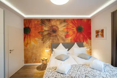 Ein Bett oder Betten in einem Zimmer der Unterkunft Seeparkvilla