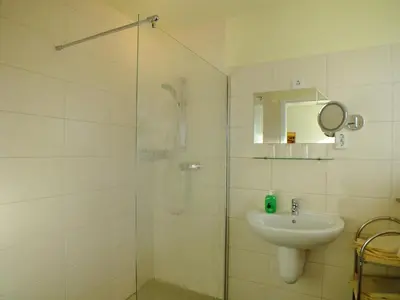 Ein Badezimmer in der Unterkunft Hotel Gasthof Goldener Hahn