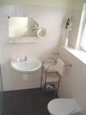Ein Badezimmer in der Unterkunft Hotel Gasthof Goldener Hahn
