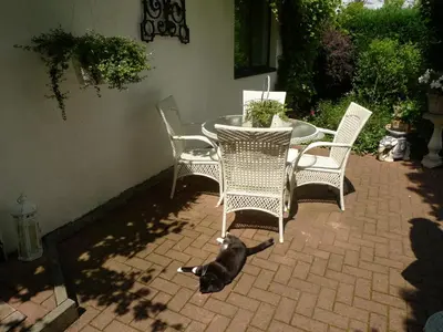 Ein Patio oder anderer Außenbereich in der Unterkunft gemütliches Gästehaus Berlin Bohnsdorf, nähe Flughafen Schönefeld