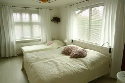 Ein Bett oder Betten in einem Zimmer der Unterkunft gemütliches Gästehaus Berlin Bohnsdorf, nähe Flughafen Schönefeld