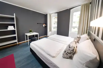 Ein Bett oder Betten in einem Zimmer der Unterkunft Old Town Hostel