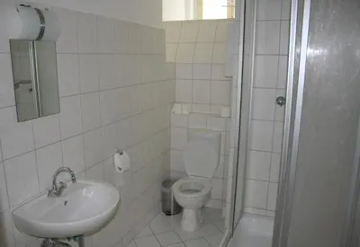 Ein Badezimmer in der Unterkunft City Hotel Gotland