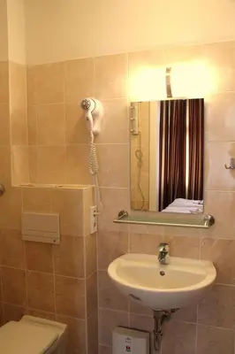 Ein Badezimmer in der Unterkunft City Hotel Gotland