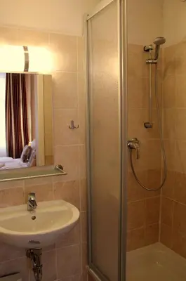 Ein Badezimmer in der Unterkunft City Hotel Gotland
