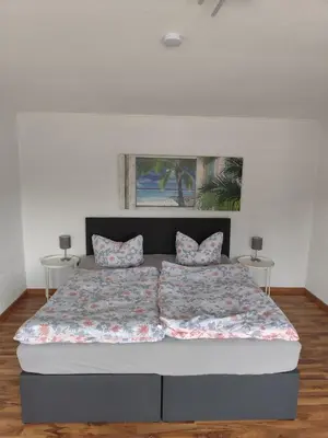 Ein Bett oder Betten in einem Zimmer der Unterkunft Ferienhaus Dobberzin nahe Mündesee
