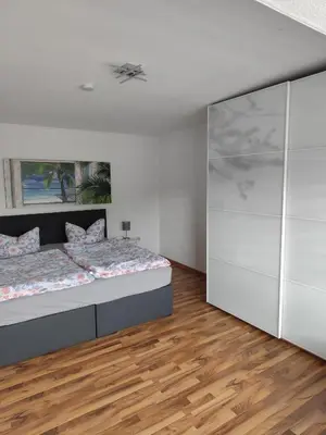 Ein Bett oder Betten in einem Zimmer der Unterkunft Ferienhaus Dobberzin nahe Mündesee