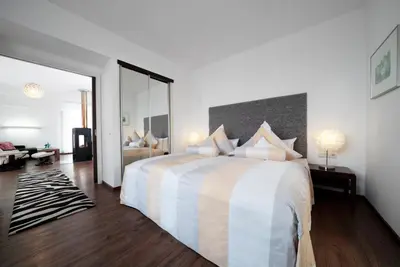 Ein Bett oder Betten in einem Zimmer der Unterkunft Resort Mark Brandenburg & Fontane Therme