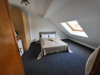 Ein Bett oder Betten in einem Zimmer der Unterkunft Albergo City Hotel Berlin